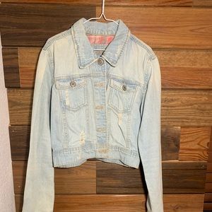 Light denim jean jacket.